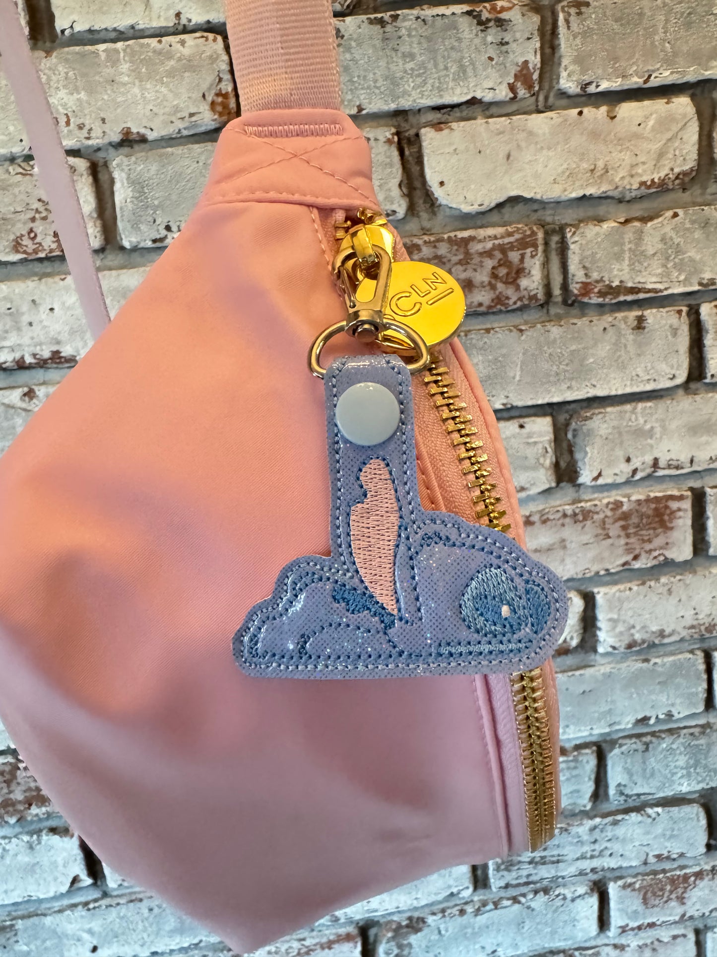 Tired Blue Alien Snap Tab Keychain – Pastel Bag Charm with Bow – Kawaii Stitch Keychain – Lilo & Stitch Zipper Pull – Handmade Vinyl Accessory