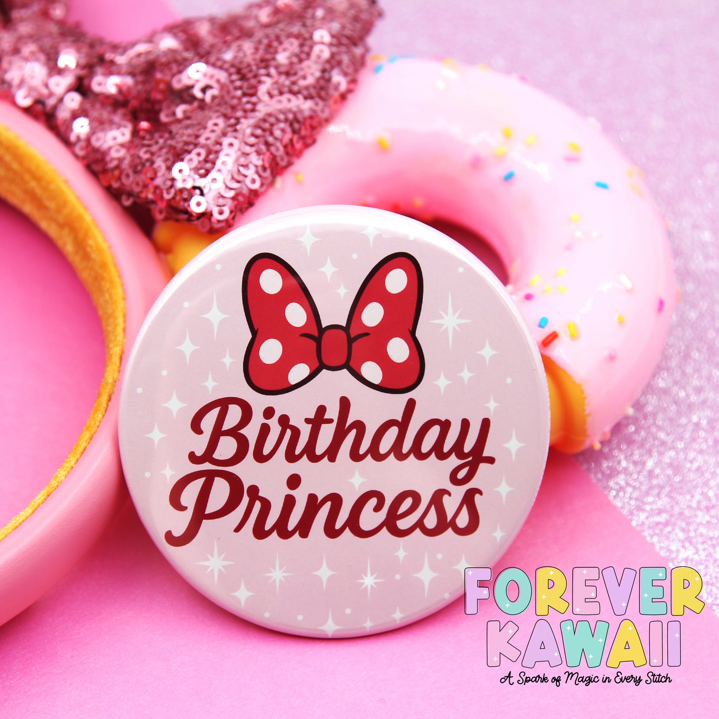 a pink birthday pin with a red bow and the text "Birthday Princess" on it, along with a pink donut and a pink sequin headband.
