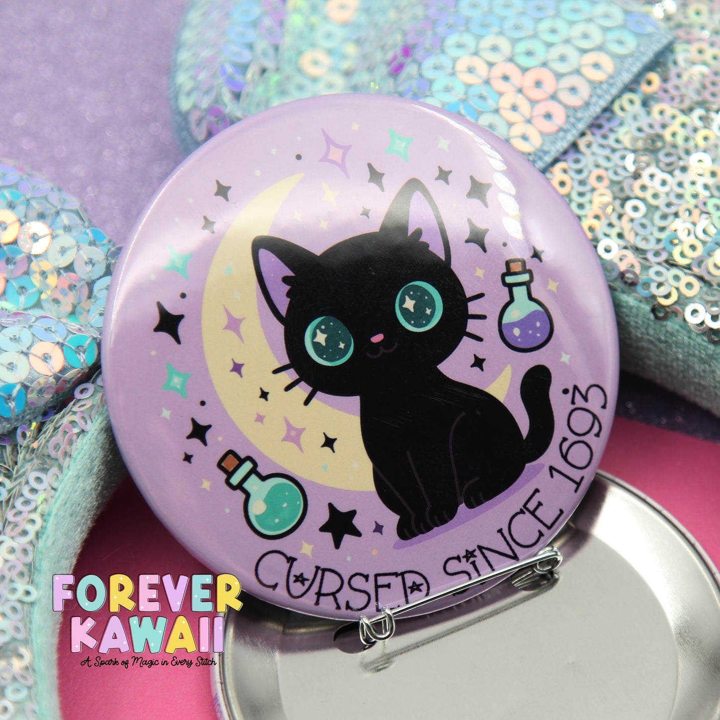A purple pin with a black cat illustration and various stars and bottles, along with the text "CURSF SINCE 1695" and "FREVER KAWAI" written on it.