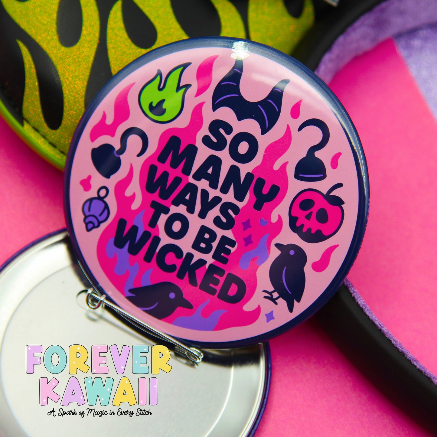 A colorful pin with the text "So many ways to be Wicked" and various whimsical illustrations, including a dragon, a witch's cauldron, and a skull.