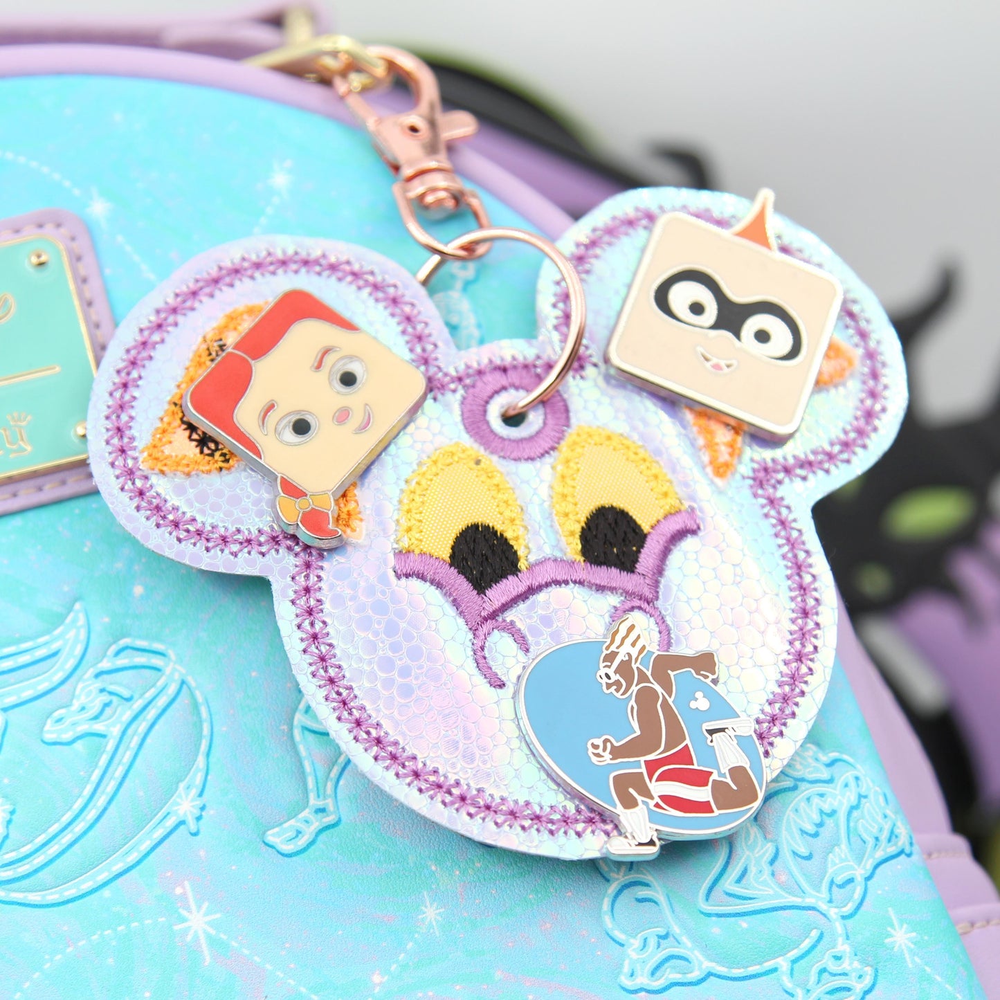 Small Iridescent Dragon Figment-Inspired Pin Trading Keychain β Embroidered Pin Holder with Cork Backing for Enamel Pins - Theme Park Pin