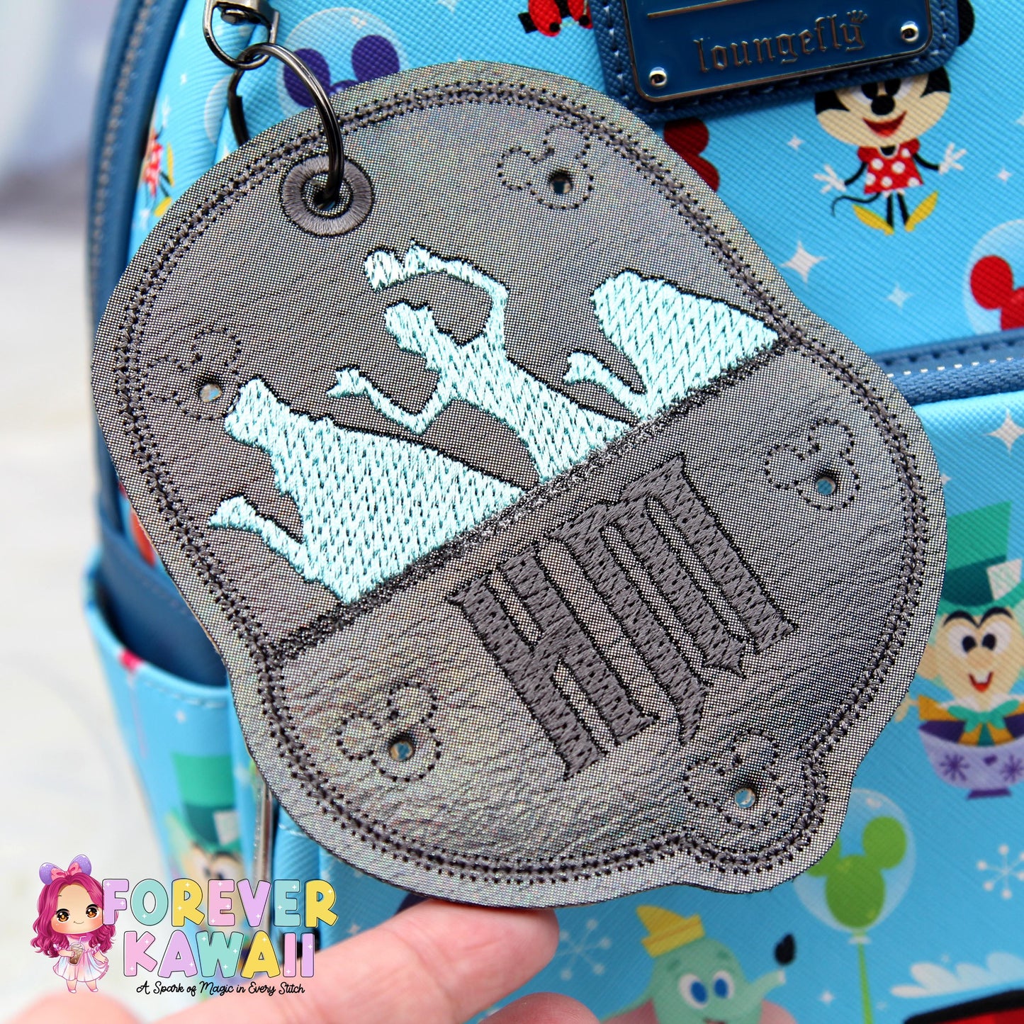 Haunted Mansion Pin Trading Keychain โ 5 Holes โ Holographic Gray Doom Buggy โ Teal Embroidered Hitchhiking Ghosts โ HM Stitched Keychain