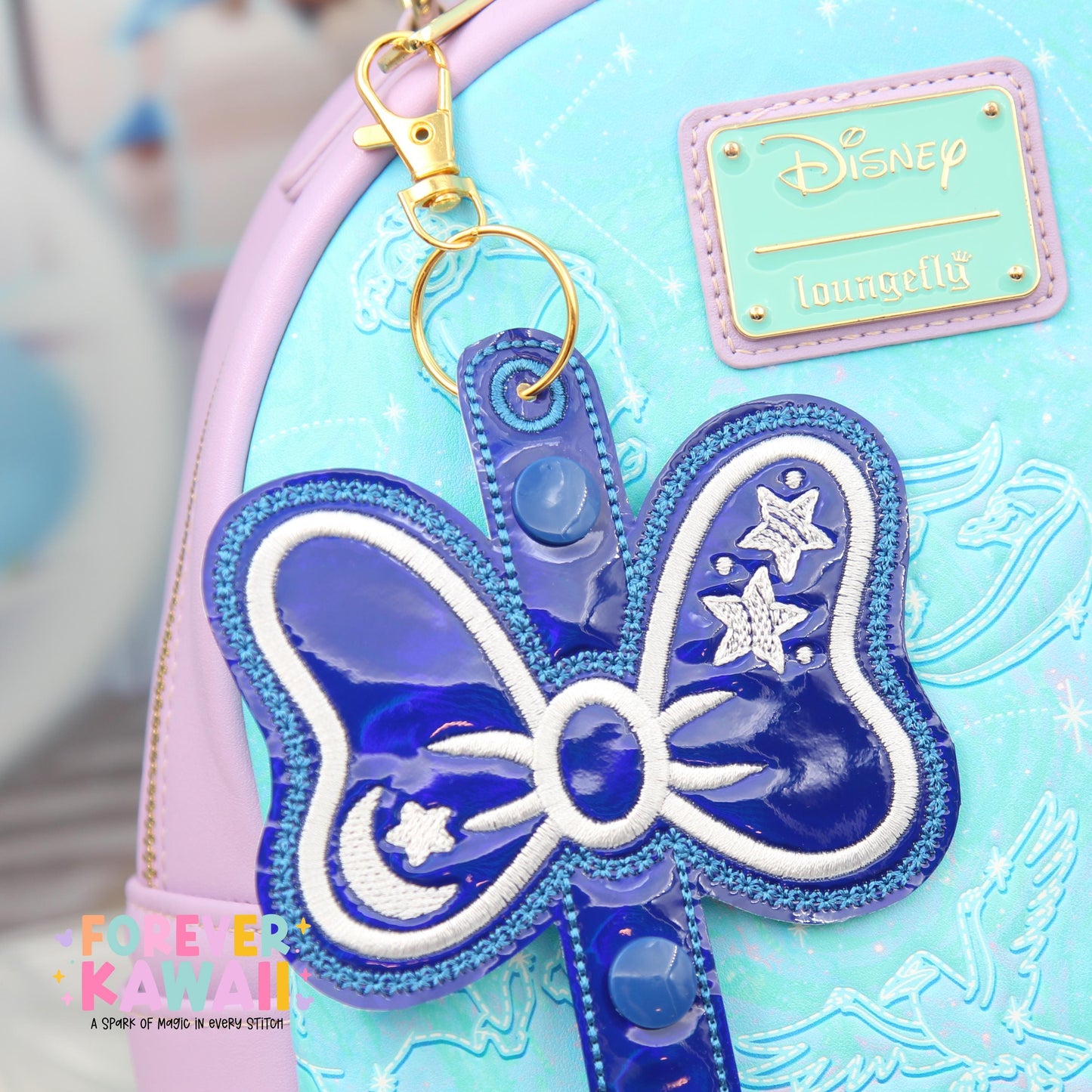 Sorcerer Mouse Bow Ear Holder | Blue Holographic Faux Leather Disney Ear & Hat Holder | Bag Charm for Sunglasses, Popcorn Bucket, Resort Mug