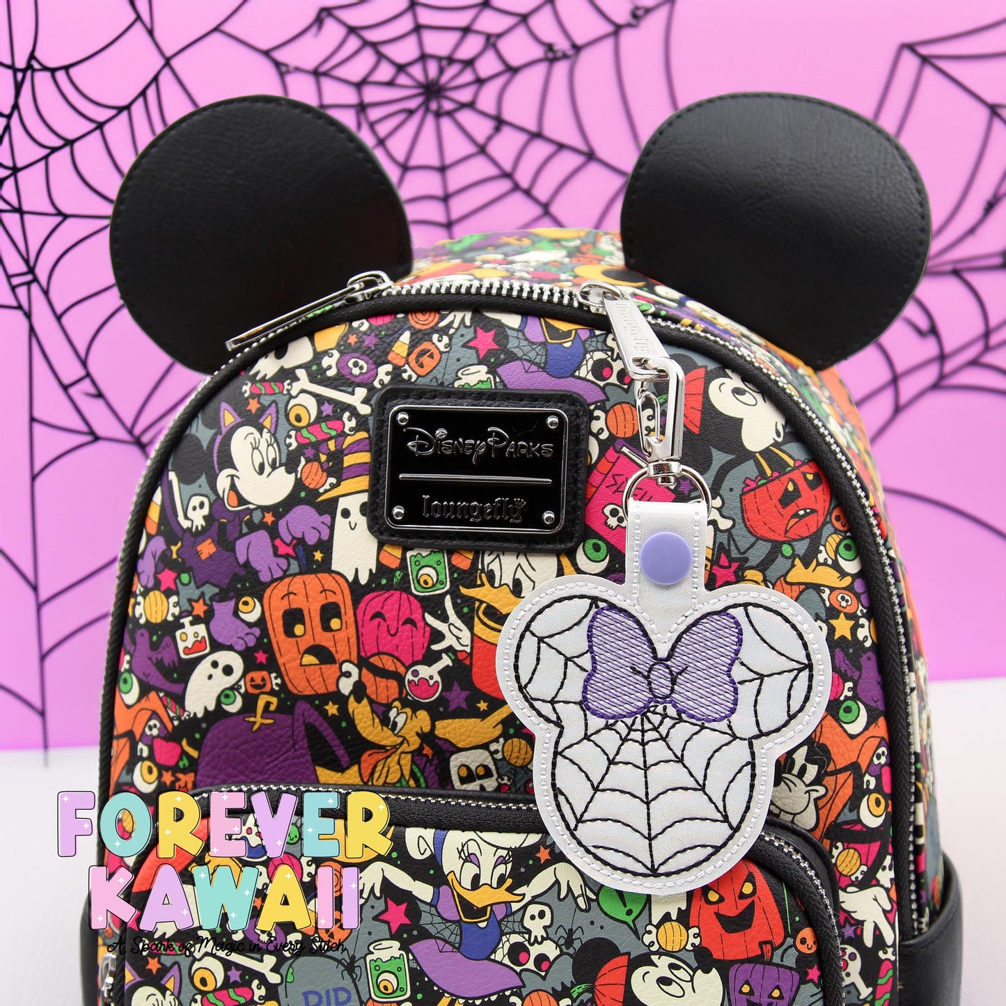 Spiderweb Mouse Ears Halloween Bag Charm with Bow | Spooky Cute Keychain | Glitter Vinyl Accessory for Backpacks, Lanyards, Park Bag Charm