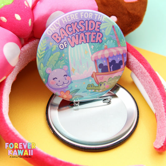 A colorful pinwheel with a playful design, featuring a cartoon character and the text "ONLY HERE FOR THE BACKSIDE OF WATER" and "Forever Kawaii" written on it.