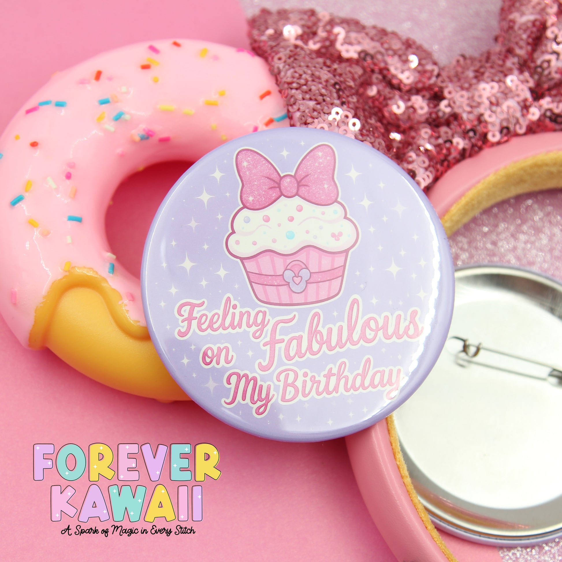 a pink donut with sprinkles, a pink sequin bow, and a pink sequin headband, all set against a pink background.