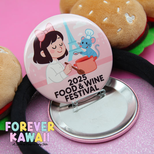 A round pin badge featuring a cartoon image of a young girl cooking with a mouse, surrounded by the text "2025 FOOD & WINE FESTIVAL" and "FREVER KAWAI" in a pink background.