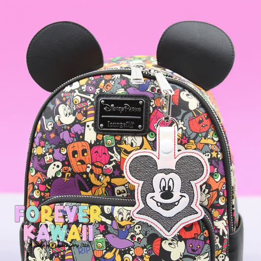 Vampire Mouse Bag Charm – Spooky Smiling Face Halloween Keychain in White Holographic Vinyl