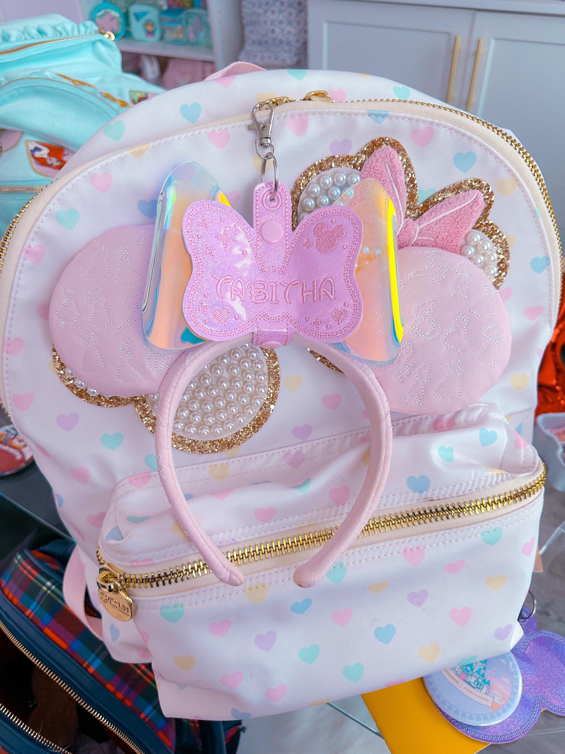 Personalized Mouse Ear Holder – Pink Bow with Pink Stitching – Mickey Ears Hanger for Park Bags – Disney Travel Gift – Ear Headband Clip