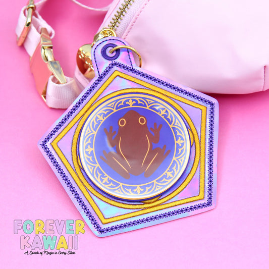 Chocolate Frog Celebration Button Holder – Holographic Vinyl with Magical Gold & Purple Details
